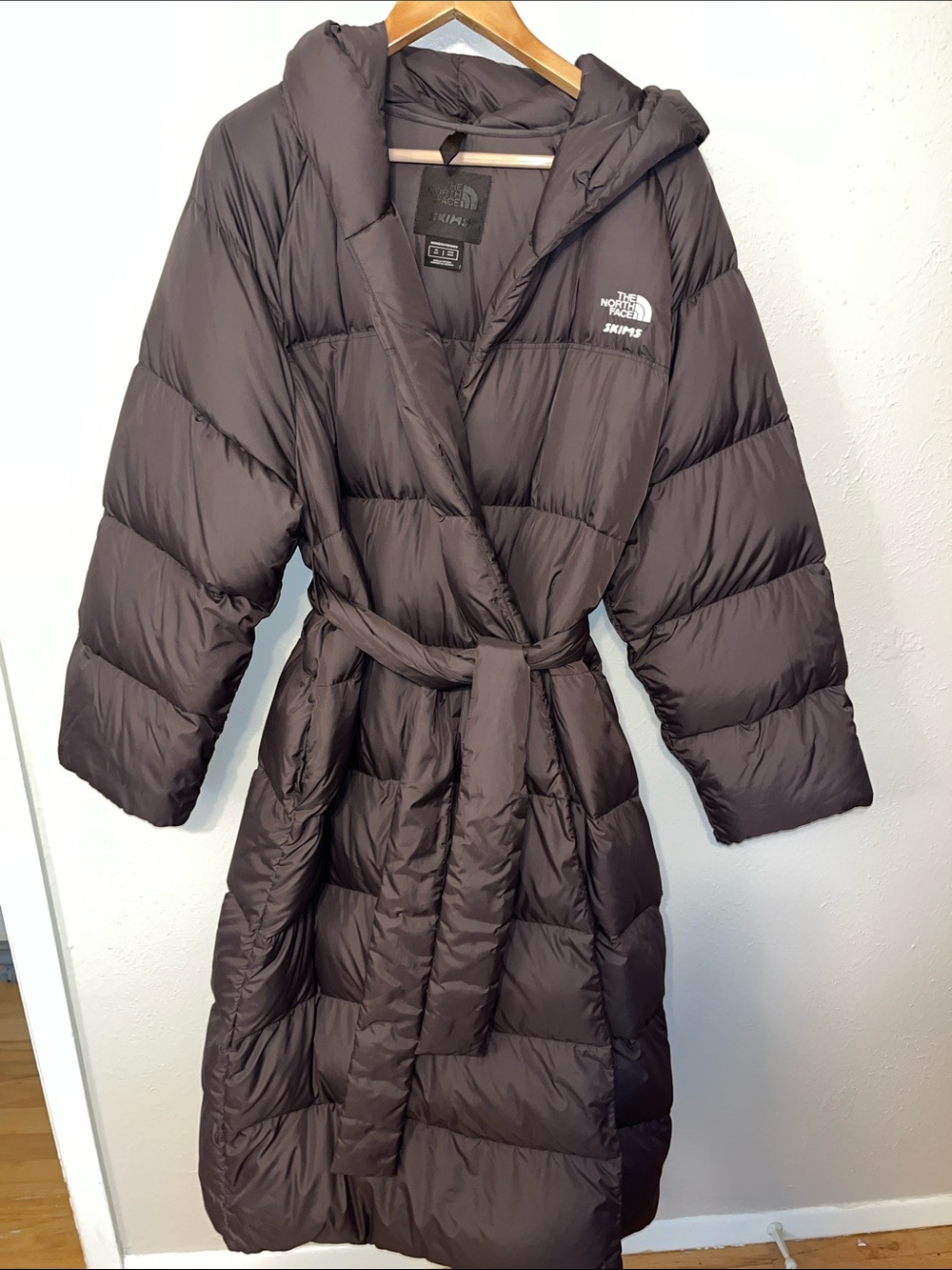 SKIMS Long Hooded Belted Puffer Coat in Purple